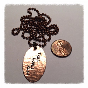 Maleficent quote, True loves kiss, elongated hammered penny necklace