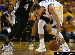 Stephen Curry #30 of the Golden State Warriors hurts his ankle against ...