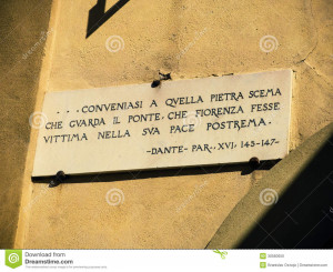 Sign of Dante quote on Ponte Vecchio, Florence, Italy.