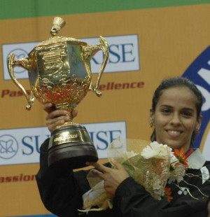 Saina Nehwal poses with the World Junior Badminton Championship trophy ...