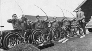 August 1953: A Dutch archery team practising from their wheelchairs ...