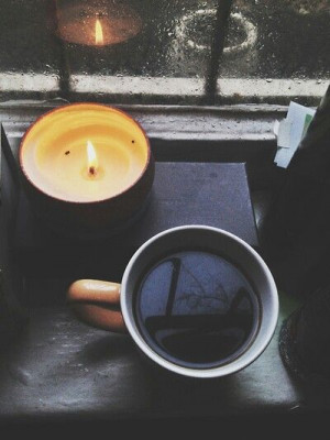 Rainy day, a cup of coffee and vanilla or apple-cinnamon scented ...
