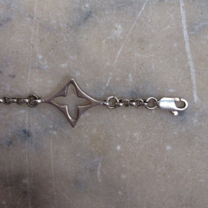 Silver Louis Vuitton monogram logo chain bracelet. I can't guarantee ...