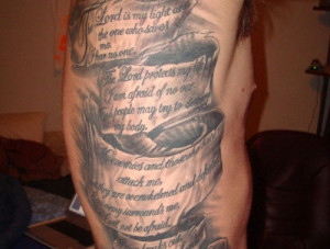 religious side with a rib tattoo that bears text taken from psalm 27 ...
