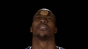 Funny Memes Dwight Howard eating a cookie placed on his forehead [GIF]