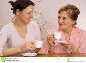 Women Drinking Tea Portrait Grandmother And Her Granddaughter