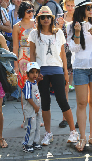 Vanisha Mittal run with his father in The Olympic Torch