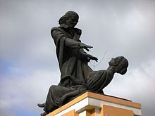 Statue of Abbé Faria hypnotising a woman next to the Old Secretariat ...