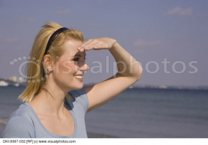 Young Woman Staring Into The Distance And Thinking