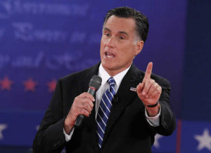Republican presidential nominee Mitt Romney answers a question as ...