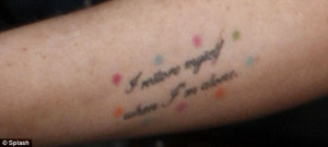 ... life': Lindsay Lohan gets a tattoo of Billy Joel lyrics on her ribcage