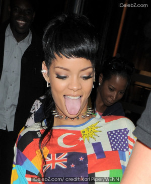 Rihanna pictured leaving her hotel in a happy and playful mood in ...