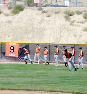 Valley High School baseball players unveil a banner in right field ...