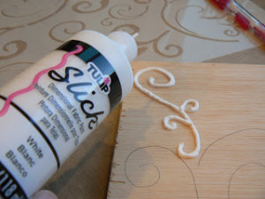... design. Then use the puffy paint to go over the pencil line design