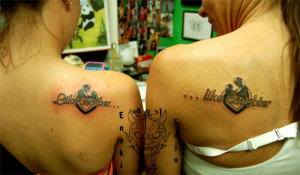 mother and daughter have identical tattoos with different wordings ...