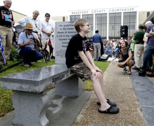 first person to sit on the bench during the unveiling of an Atheist ...