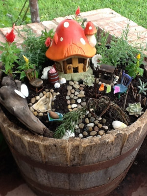 What a cute little fairy garden in a bucket, perfect for creative play ...