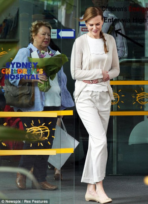 Demure: The Moulin Rouge star was dressed casually in cream for her ...