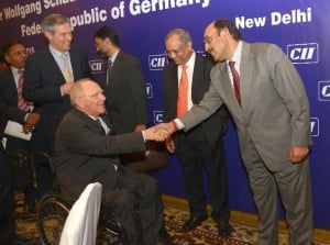 Finance Minister of Germany, Wolfgang Schauble being greeted by ...