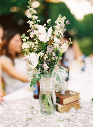 Southern wedding – wildflower centerpiece. I love the little white ...