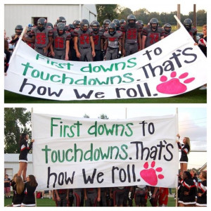 Football run through sign- the cheerleaders are really on their game ...