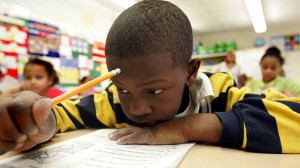 Second grade student Kaign Groce, 7, reads a book Wednesday, Feb. 1 ...