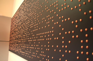 ... ft-by-9-ft (0.9-m-by-2.7-m) panel featuring 10 quotations in Braille