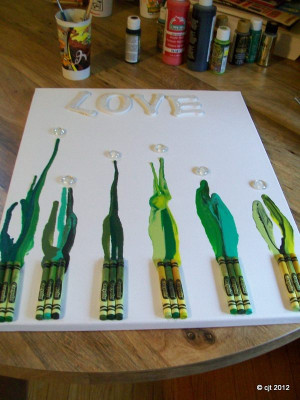 Using a hot gun or you can use a blow dryer I melted the crayons.