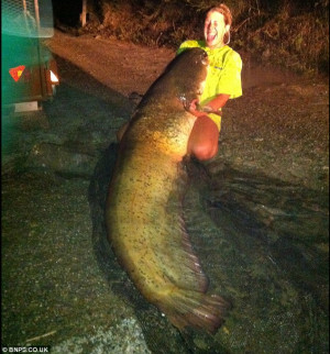 Delight! Alexa Turness, 28, pictured holding the huge fish she hooked ...
