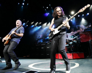 ... band Rush, performing live in 2007, with drummer Neil Peart in the