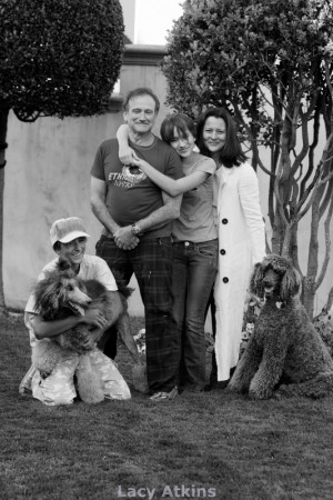 Robin Williams and family with two standard poodles