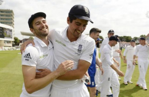 ... Alastair Cook celebrates with Mark Wood after the fourth Ashes Test