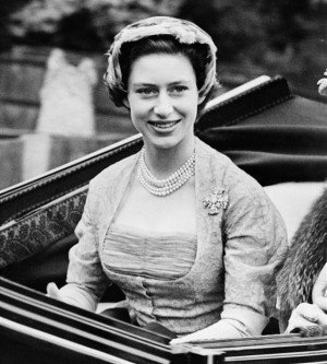 Princess Margaret wears a 1952 gray lace dress by Norman Hartnell. The ...