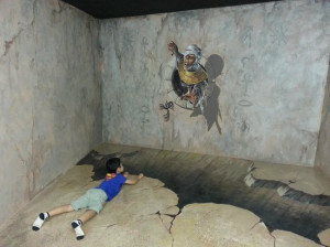 Art in Paradise, Chiang Mai 3D Art Museum: My son posing on one of the