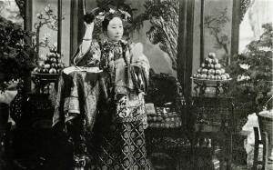 The Empress Cixi putting flower in her hair Photo: Freer Sackler ...