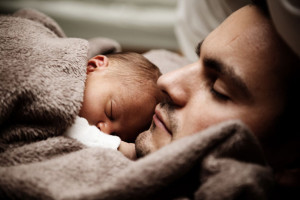 Baby And Dad Sleeping by Vera Kratochvil