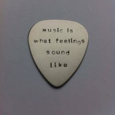 Hand stamped personalised metal plectrum - music is what feelings ...