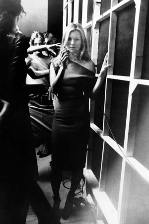 Kate Moss backstage at Versus, 1997. Photograph by Sante D’Orazio.
