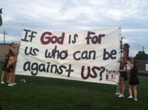 Cheerleaders from Kountze High School in Texas hold up sign displaying ...