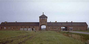 The entrance to the feared death camp of Auschwitz, author ...
