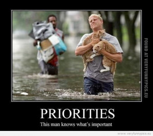 Funny Picture - Priorities this man knows whats inportant - Saving his ...
