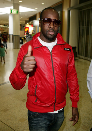 Wyclef Jean at an airport on 4/22/08]