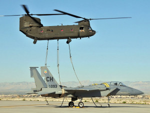 The helicopter can also be used to transport planes, like this F-15A ...