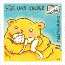 Bear hug picture from the series german stamps for children, showing a ...