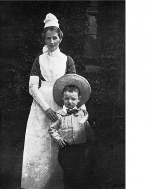 Edith as a governess with a young boy