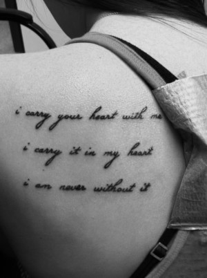 carry your heart…” quote tattoo on the back of girls shoulder