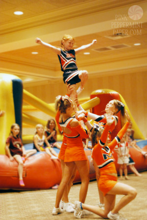 Cheer Stunts at Toe Touches & Touchdowns on PinkPeppermintPaper.com