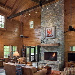 The great room of this Honest Abe Log Home, featuring two stories of ...