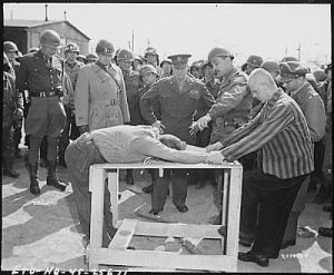 General Dwight D. Eisenhower watches as prisoners demonstrate how they ...