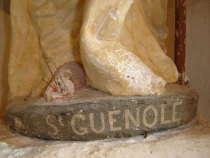 The feet of Saint Guénolé (Winwaloe, Guignolé) statue, in a Prigny ...